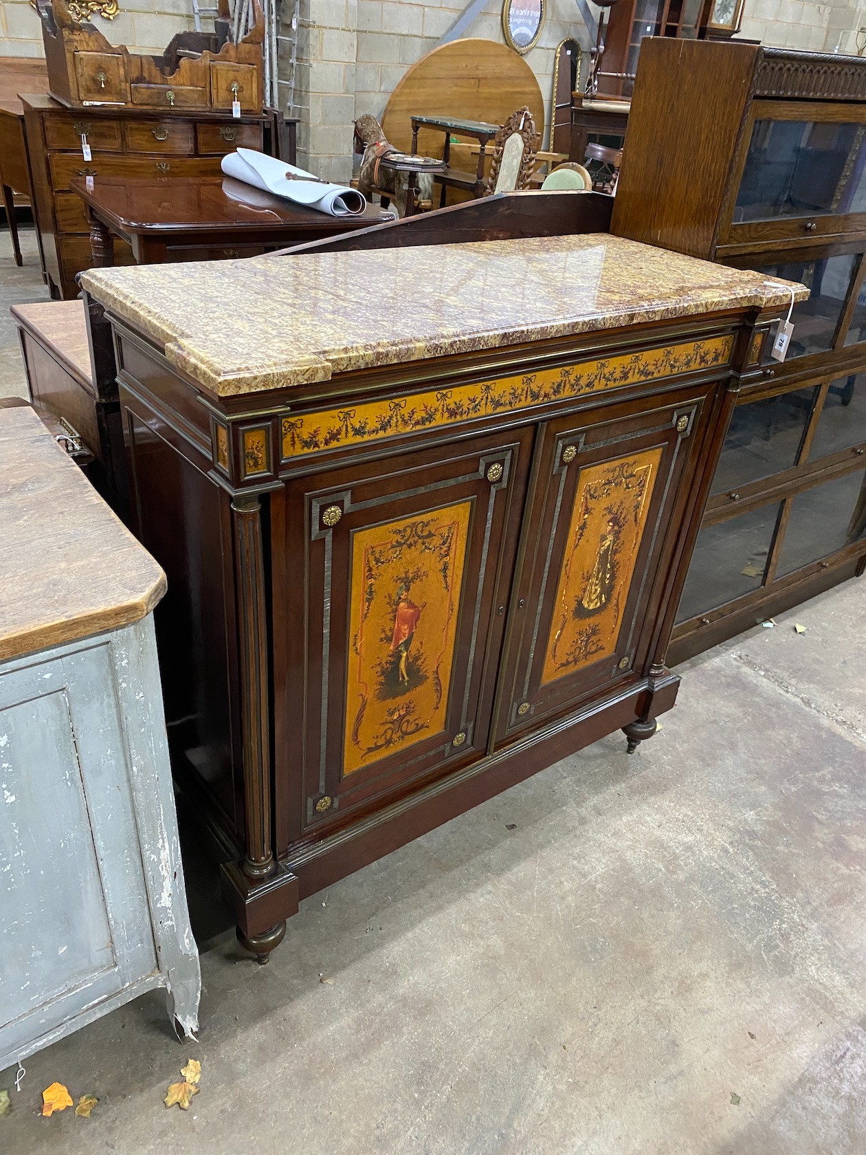 A French painted gilt metal mounted marble top side cabinet, width 118cm, depth 50cm, height 116cm